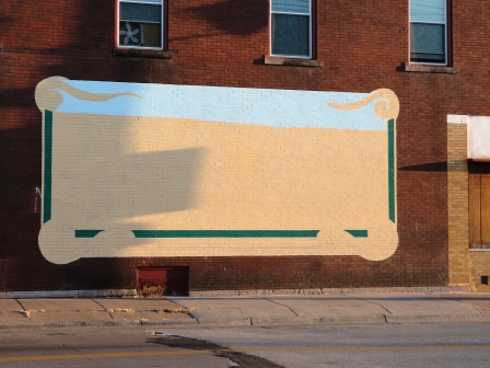 For decades, the names of two guys named Mike and a Tom were spraypainted unceremoniously on this wall, now that has been painted over.