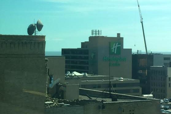Crumbled chimney bricks on the roof of the Board of Trade Building.