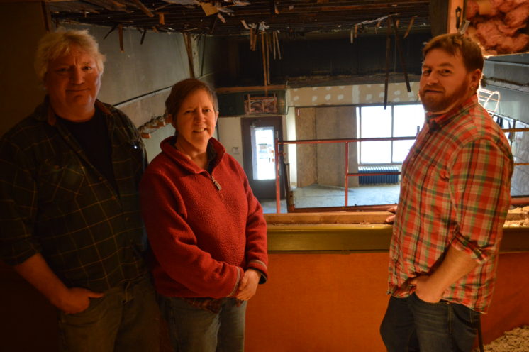 Duluth Pottery co-owners Tom Hollenhorst and Karin Kraemer pose in the loft of their new art studio with partner artist Luke Krisak. Duluth Pottery is remodeling the former P&J Paint building in the West End.